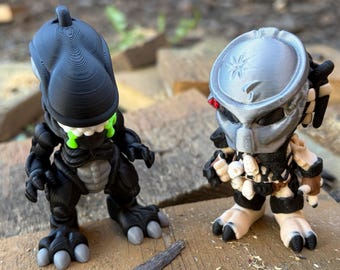 Xenomorfo flessibile stampato in 3D con testa extra e statuetta di Predator