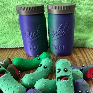 3D printed Pickles keychains, get a choice of a Pickle Jar w/a pickle, 3 individual pickles or a 3 pk in a case w/& a surprise pickle