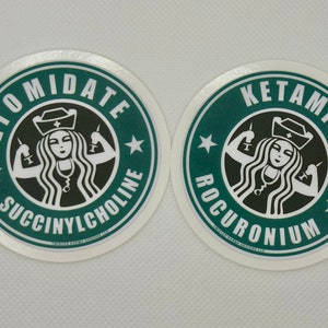 May include: Two round stickers with a green background and white border. Each sticker features a stylised image of a woman with long hair wearing a nurse's cap and holding syringes in each hand. The text "ETOMIDATE SUCCINYLCHOLINE" is written around the image on the left sticker. The text "KETAMINE ROCURONIUM" is written around the image on the right sticker.