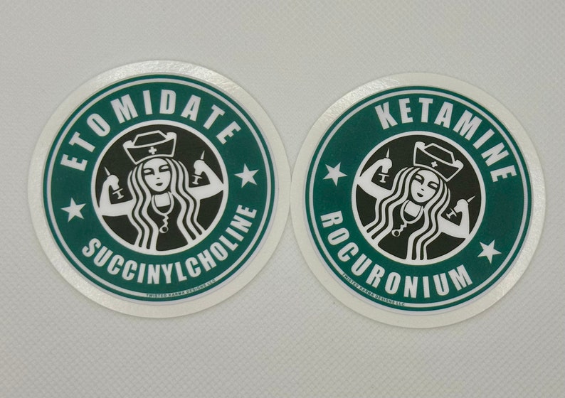 May include: Two round stickers with a green background and white border. Each sticker features a stylised image of a woman with long hair wearing a nurse's cap and holding syringes in each hand. The text "ETOMIDATE SUCCINYLCHOLINE" is written around the image on the left sticker. The text "KETAMINE ROCURONIUM" is written around the image on the right sticker.
