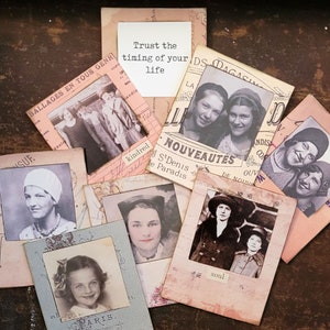 May include: A collection of vintage-style photo cards with images of people and text. The cards are decorated with a variety of patterns and textures, including floral designs, stripes, and polka dots. The text on the cards includes the words "Trust the timing of your life", "kindred", "soul", and "NOUVEAUTES".