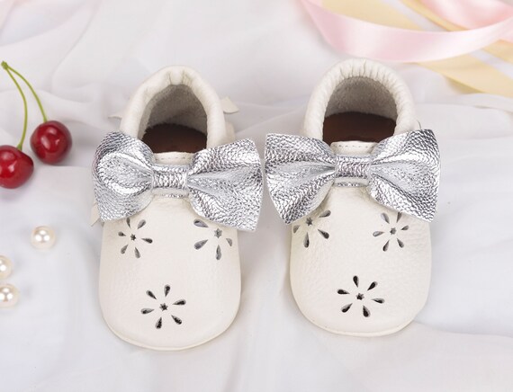 white hard bottom baby shoes