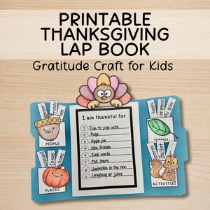 May include: A printable Thanksgiving lap book for kids. The blue booklet features a turkey illustration and prompts for gratitude, with categories for people, places, things, and activities. The text on the top says "PRINTABLE THANKSGIVING LAP BOOK" and "Gratitude Craft for Kids".