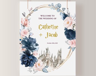 Puede incluir: Una invitación de boda con una corona floral de acuarela en tonos rosa y azul, con una ilustración de castillo y el texto "Bienvenido a la boda de Catherine + Jacob, 20 de octubre de 2025".