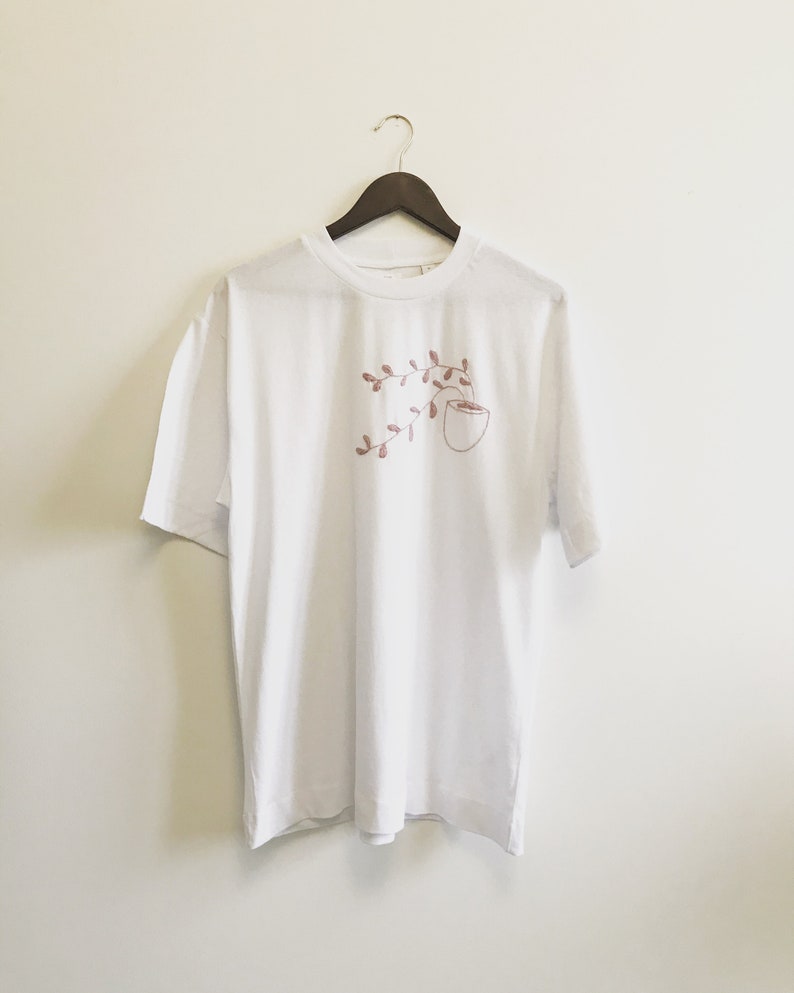 Hand embroidered T-shirt Small pot with lila plants