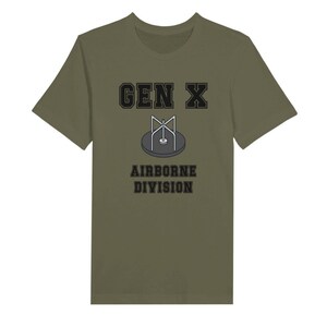 Bella Canvas 3001 T-Shirt with  the words generation X in black graphics a photo of a vintage play ground round and round and the words airborne division underneath in black graphics. The TShirt is athletic military green