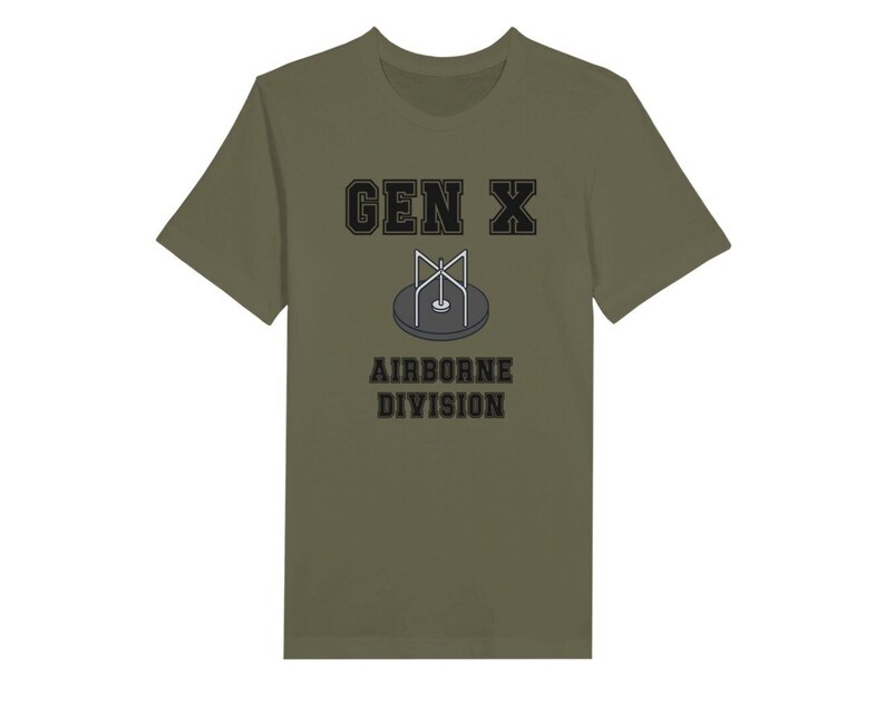 Bella Canvas 3001 T-Shirt with  the words generation X in black graphics a photo of a vintage play ground round and round and the words airborne division underneath in black graphics. The TShirt is athletic military green