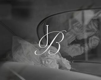 May include: A monochrome image showing a JB monogram in elegant script. A veil and roses are visible, suggesting a wedding or bridal theme. The overall aesthetic is soft and romantic, with a focus on delicate details.