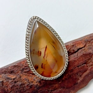 Handgefertigter Ring aus Sterlingsilber mit Montana-Achat und Boho-Kristall