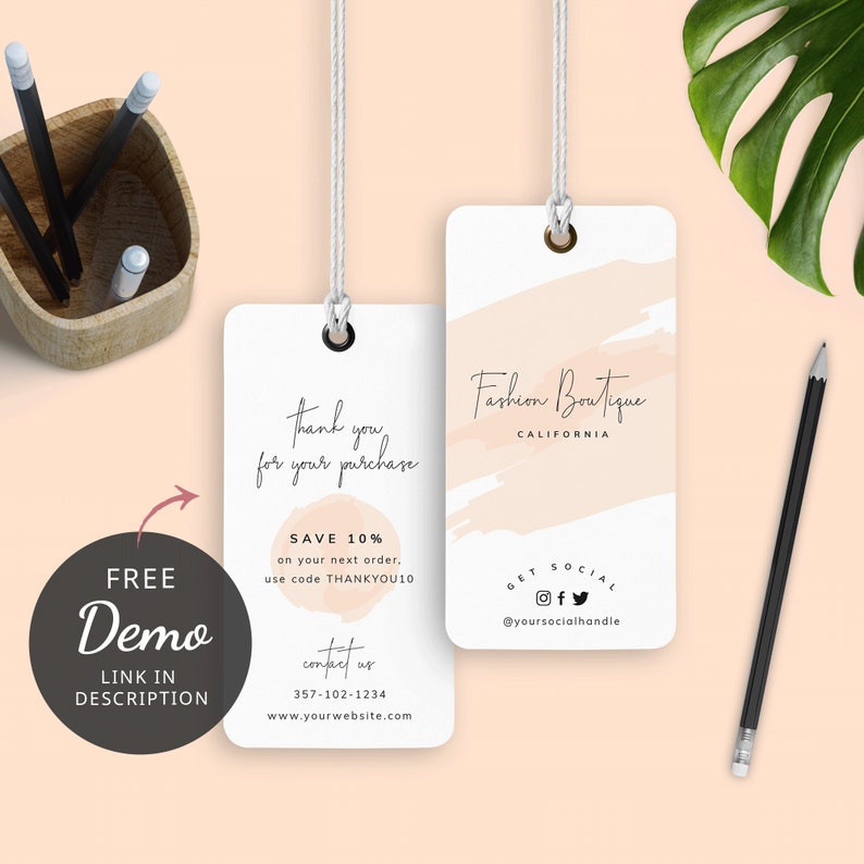 May include: Two white hang tags with a pink watercolor design. The top tag says "Fashion Boutique California" and the bottom tag says "Thank you for your purchase. Save 10% on your next order, use code THANKYOU10. Contact us 357-102-1234 www.yourwebsite.com".
