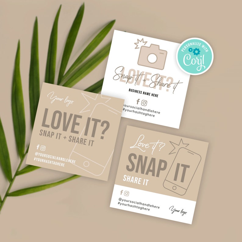 May include: Two square cards with a brown background and white text. The top card says "Snap it Share it" with a camera icon and the text "Love it?" in a cursive font. The bottom card says "Love it? Snap it Share it" with a camera icon and the text "Love it?" in a cursive font. Both cards have social media icons and text for a business name, social media handle, and hashtag.