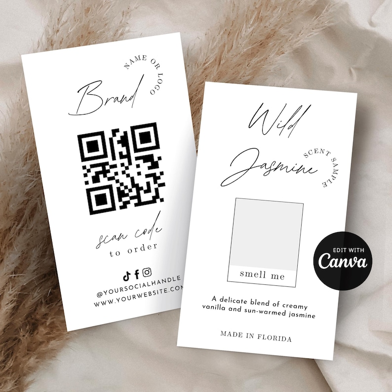 May include: Two white cards with black text and a minimalist design. One card features a QR code and the words "Brand" and "scan code to order." The other card says "Wild Jasmine Scent Sample" and "smell me." The text "Edit with Canva" is also visible.