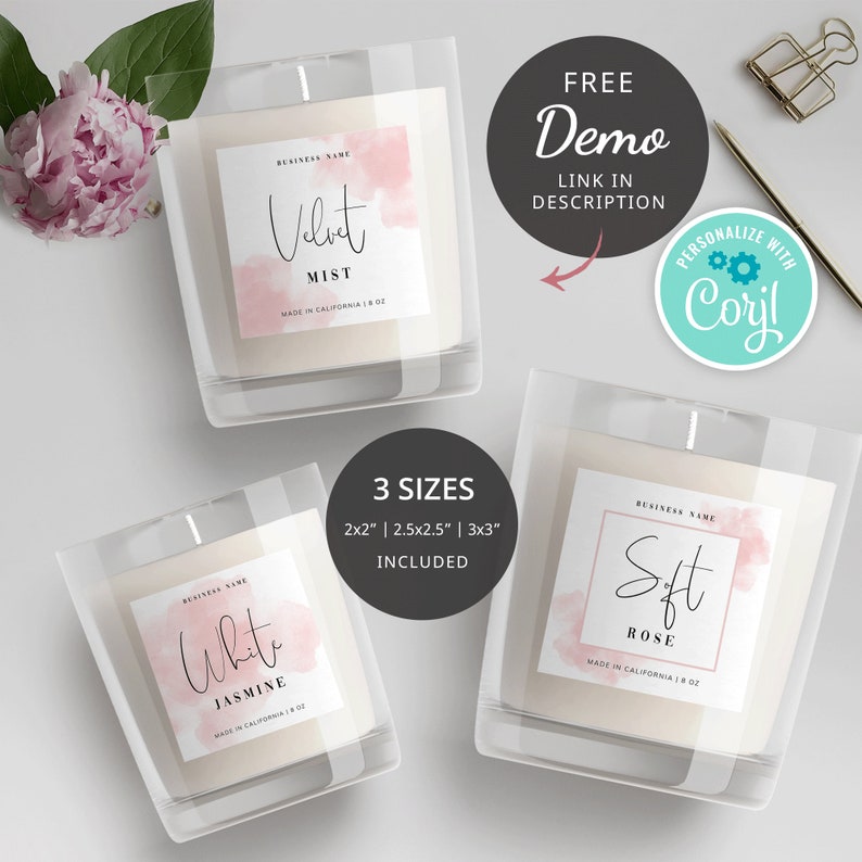 May include: Three candle jars with labels featuring watercolor-style pink backgrounds and handwritten text. The labels read "Velvet Mist", "White Jasmine", and "Soft Rose". Each label includes the text "Business Name" and "Made in California 8 oz". The text "3 Sizes 2x2" | 2.5x2.5" | 3x3" Included" is also visible.