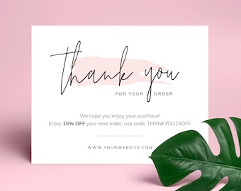 May include: A white thank you card with a pink brushstroke and black text. The text reads "thank you for your order". The card also includes the text "We hope you enjoy your purchase! Enjoy 15% OFF your next order, use code: THANKYOU15OFF WWW.YOURWEBSITE.COM"