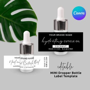 Puede incluir: Plantilla de etiqueta de mini frasco cuentagotas con un frasco blanco y plateado. La etiqueta dice "Nail and Cuticle Oil" y "Hydrating Cuticle Oil". Las botellas están etiquetadas "Made in USA" y contienen 3 ml de producto. La plantilla es editable.