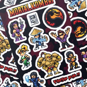 A sticker sheet featuring characters from classic Mortal Kombat drawn in a retro pixel art style.