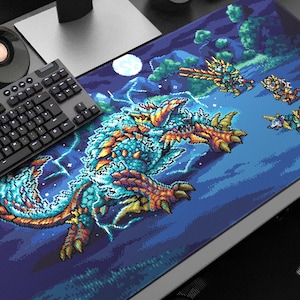 May include: A pixelated art mousepad featuring a large, teal and orange dragon with lightning bolts, and several smaller, armored characters. The background is a dark blue sky with a full moon and trees. A keyboard and speaker are visible.