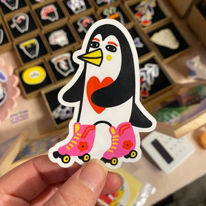 Roller skating penguin sticker