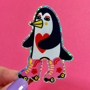 Sticker pingouin rollers holographique