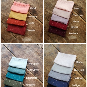May include: A set of 10 fabric swatches in various colors, including coral, mustard, rust, burgundy, rose, old rose, mauve, maroon, white, light blue, teal, dark blue, green, and dark green. Each swatch has a subtle pattern of gold glitter dots.
