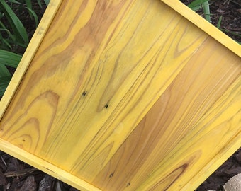 Yellow tray for outdoor covered patio.