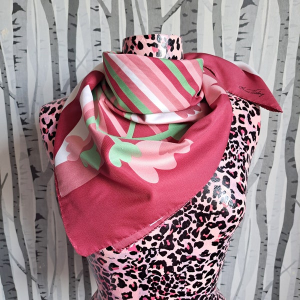 Fabulous original 1970s vintage scarf with a striking pink and green flower power design. Vintage 70s headscarf.