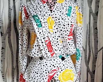 Fabulous vintage 80s dalmatian spot blouse with bright coloured roses. 1980s long sleeve blouse by Gina Bacconi. UK size 4/6