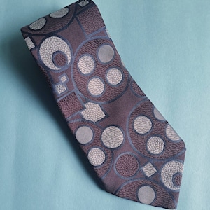 Vintage 1970s blue and lilac large circle geometric pattern tie. Original 70s polyester necktie. Wide kipper tie by Co op Ritz