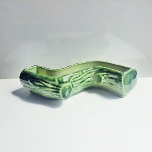 WADE Small dark green log, whimsical posy vase by Wade Pottery. Kitsch ceramic bud vase in the shape of a twig.