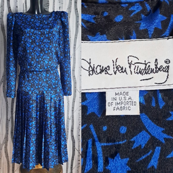 Vintage DVF 1980s abstract print party dress in black and blue by Diane Von Furstenberg.  80s shooting star print dress. Fits UK size 8-10
