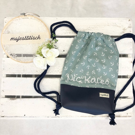 Mint blue backpack cheap
