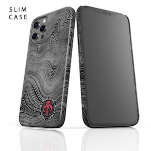 May include: A black and white phone case with a wavy pattern and a red Mandalorian symbol. The case is designed for a phone with a triple camera lens.