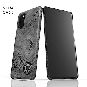 May include: A black phone case with a white wavy pattern and a silver Imperial symbol. The case is designed to fit a slim phone.
