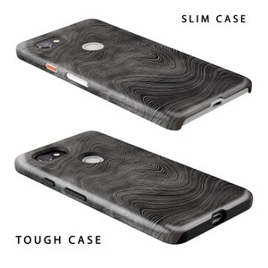 May include: Two phone cases with a black and white wavy pattern. The top case is labeled "SLIM CASE" and the bottom case is labeled "TOUGH CASE".