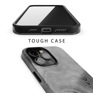 May include: A black phone case with a white and gray wavy pattern. The case has a raised camera bump and a cutout for the phone's charging port. The text "TOUGH CASE" is printed on the case.