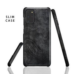 May include: A black phone case with a wavy, abstract pattern. The case is slim and has a cutout for the camera lens.