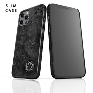 May include: A black phone case with a wavy pattern and the Star Wars Imperial symbol. The case is designed to fit a slim phone. The case is shown next to a black phone.