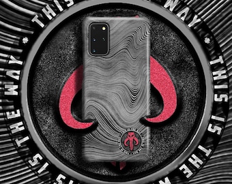 May include: A black phone case with a wavy pattern and a Mandalorian symbol. The case has the text "This is the way" around the edge.