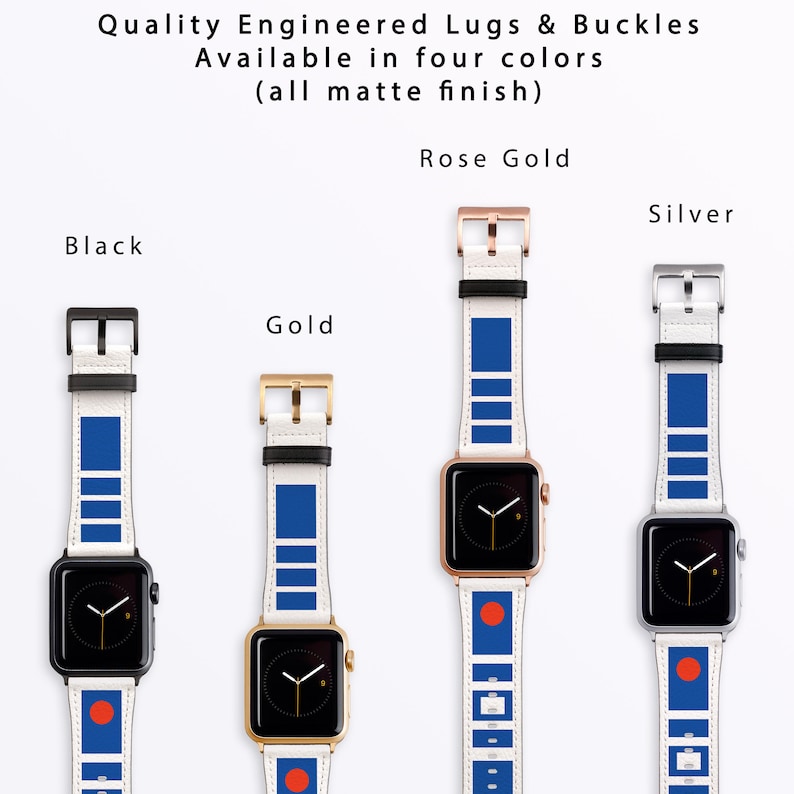 May include: Four Apple Watch bands with different coloured lugs and buckles. The bands are white with blue stripes and a red circle on the bottom. The lugs and buckles are black, gold, rose gold, and silver.