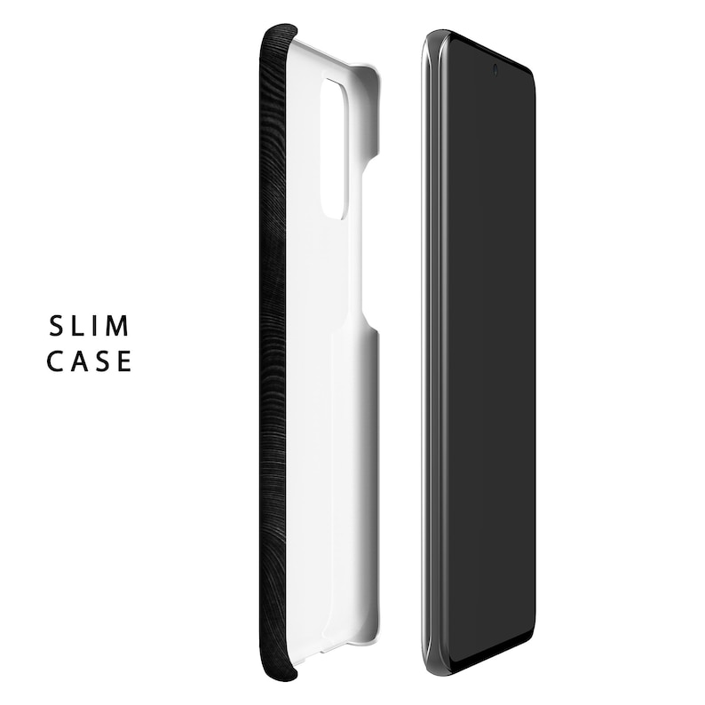 May include: A black phone case with a wood grain pattern. The case is shown open and closed, revealing a white interior.
