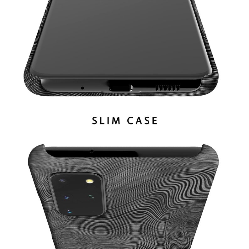 May include: A black phone case with a wood grain pattern. The case is designed to fit a phone with a camera bump. The text "SLIM CASE" is printed on the case.