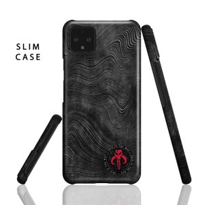May include: A black phone case with a wavy pattern and a red Mandalorian symbol with the text "This is the way - This is the way".