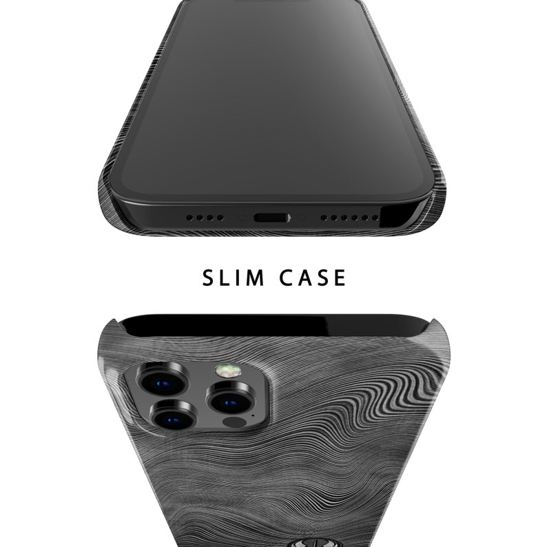 May include: A black phone case with a wood grain pattern. The case is designed to be slim and fits snugly around the phone. The case has a cutout for the camera lens and a raised lip around the screen to protect it from scratches.