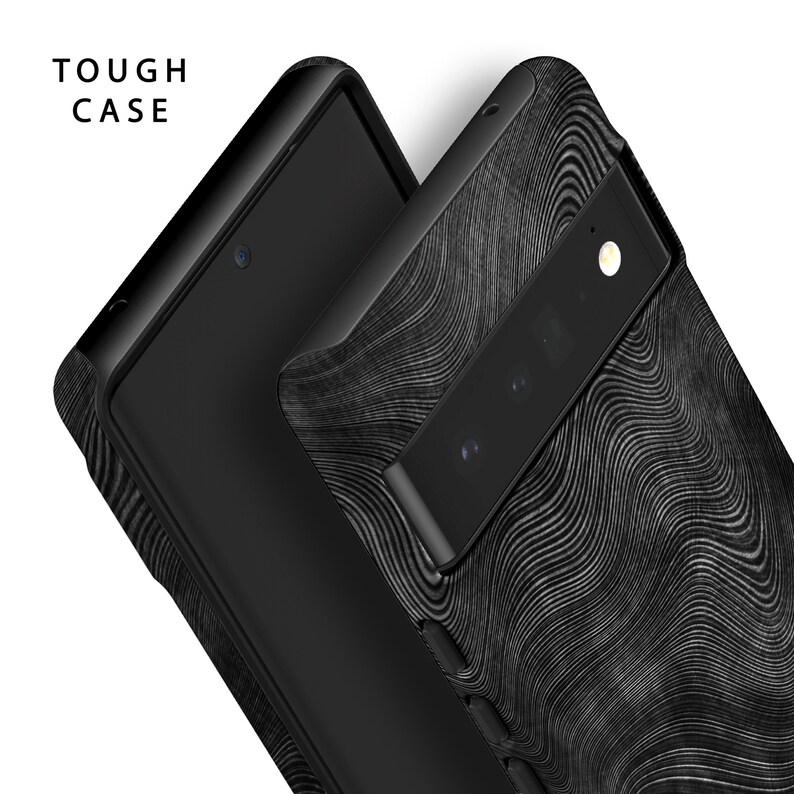 May include: A black phone case with a textured, wavy pattern. The case has a raised camera bump and the text "TOUGH CASE" is visible in the top left corner.