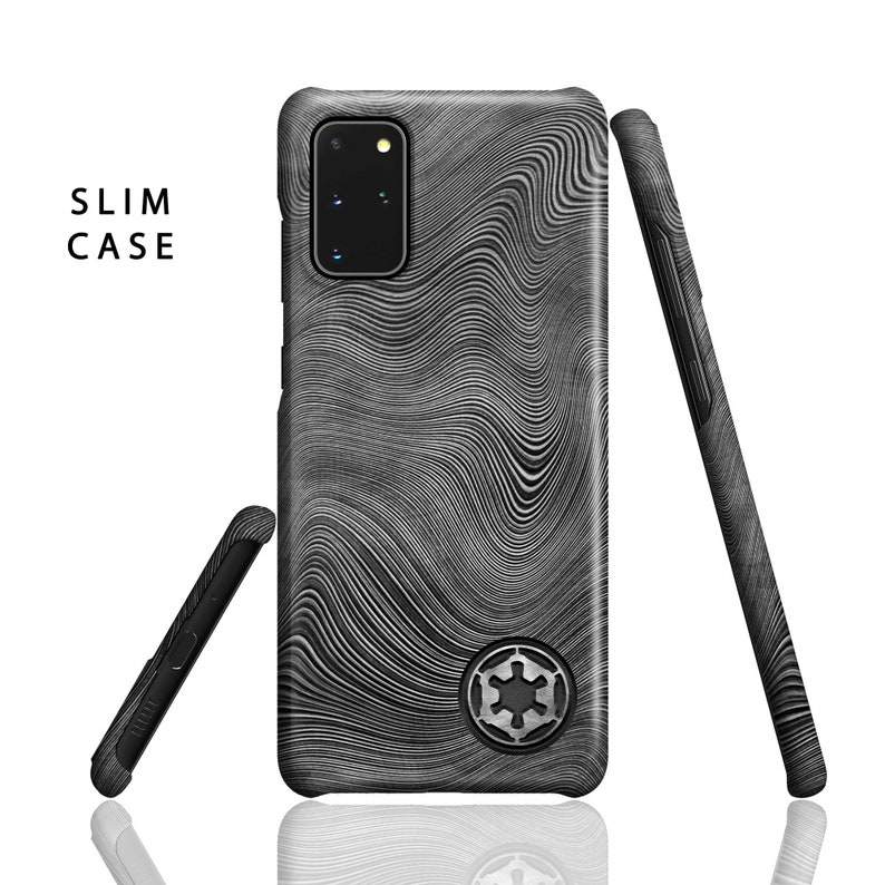 May include: A black phone case with a wavy pattern and a silver Imperial symbol. The case is designed for a Samsung Galaxy phone. The text "SLIM CASE" is visible in the top left corner.