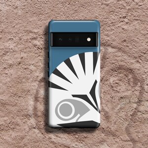 May include: A blue phone case with a white and black geometric design. The case has a camera cutout and a black border.