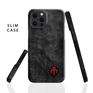 May include: A black phone case with a wavy pattern and a red Mandalorian symbol. The text "This is the way - This is the way" surrounds the symbol.