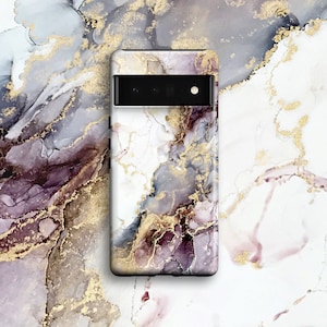 May include: A phone case with a white, gray, and gold marble design. The case has a black camera cutout.