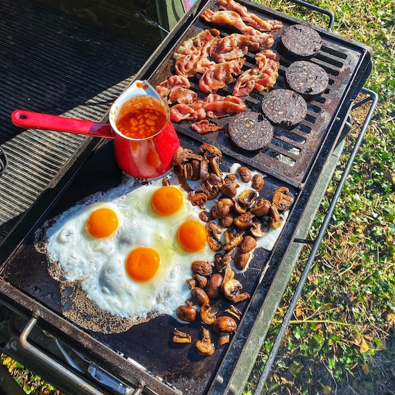 Pancakes on the griddle over the camp fire. Kids loved 'em. : r