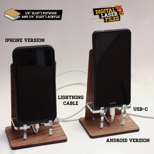 May include: Two phone stands made of wood and acrylic, one for an iPhone with a Lightning cable and one for an Android phone with a USB-C cable. The stands are designed to hold the phone upright and allow for charging. The text "DIGITAL LASER FILES" is visible in the top right corner of the image.